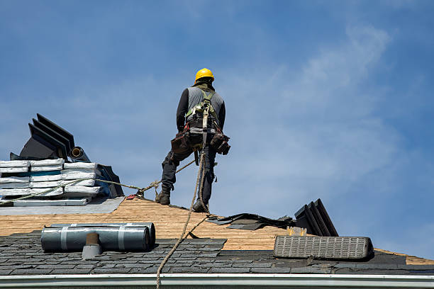 Professional Roofing technician working in Water Mill, NY